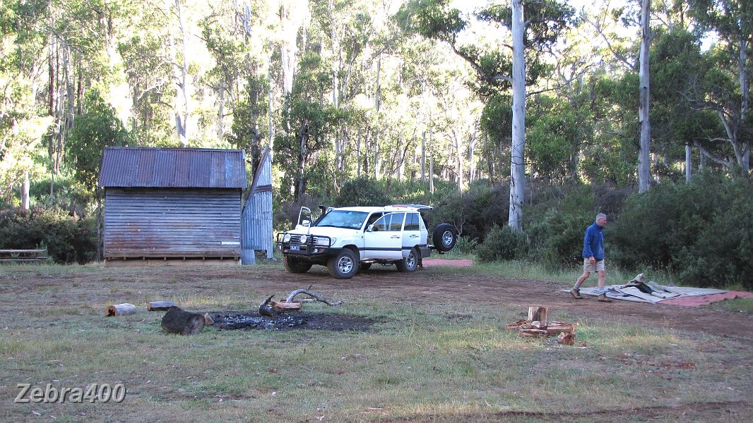 21-Lofty packs up after a great night at Mt Pinnibar Hut.JPG - 21-Lofty packs up after a great night at Mt Pinnibar Hut